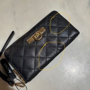 DKNY black leather wallet, Front of the wallet is scratched